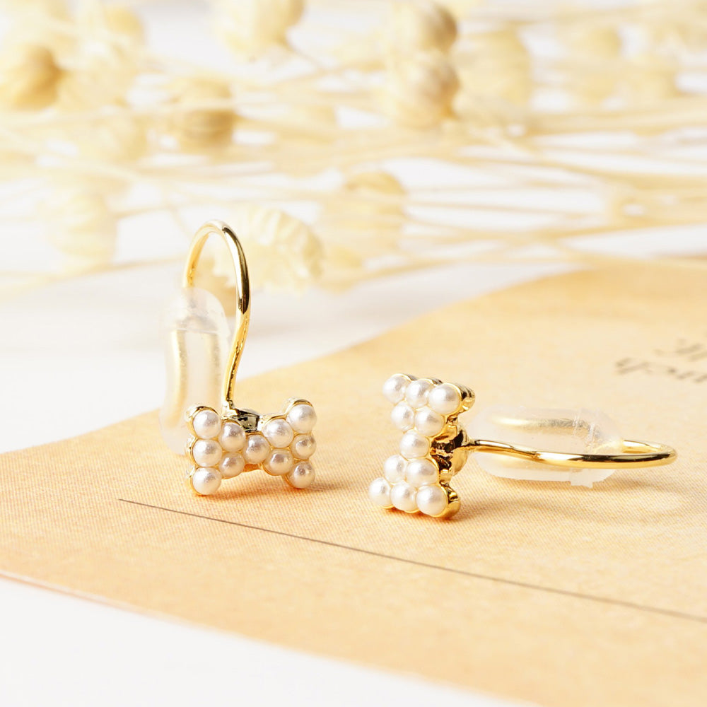 パール リボン ノンホールピアス